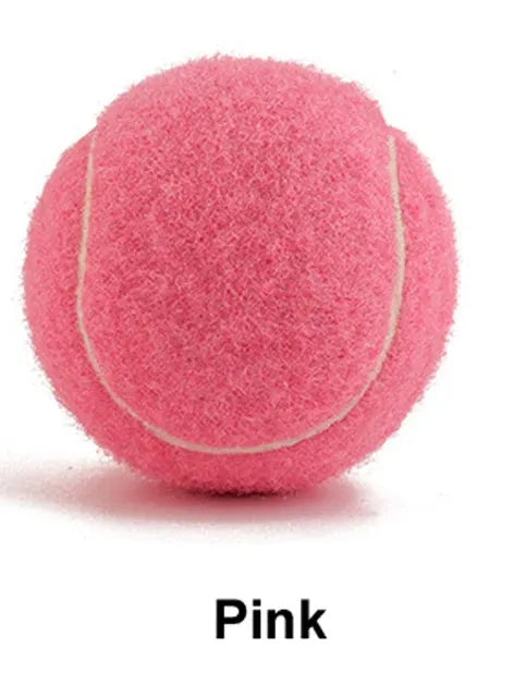 Bite-resistant rubber dog tennis ball in multiple colours including pink, blue and green