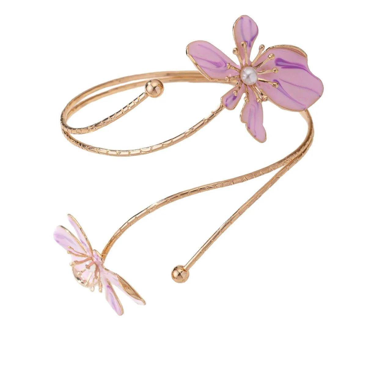 Pink hollow metal bangle with engraved pattern on a wrist, showing its open design and lightweight profile.