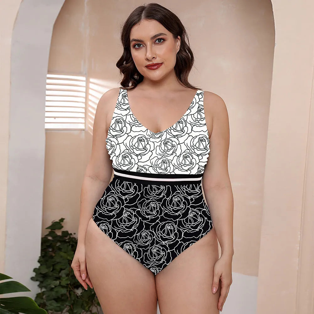 Women's printed one-piece swimsuit with spaghetti straps and a striped vest design.