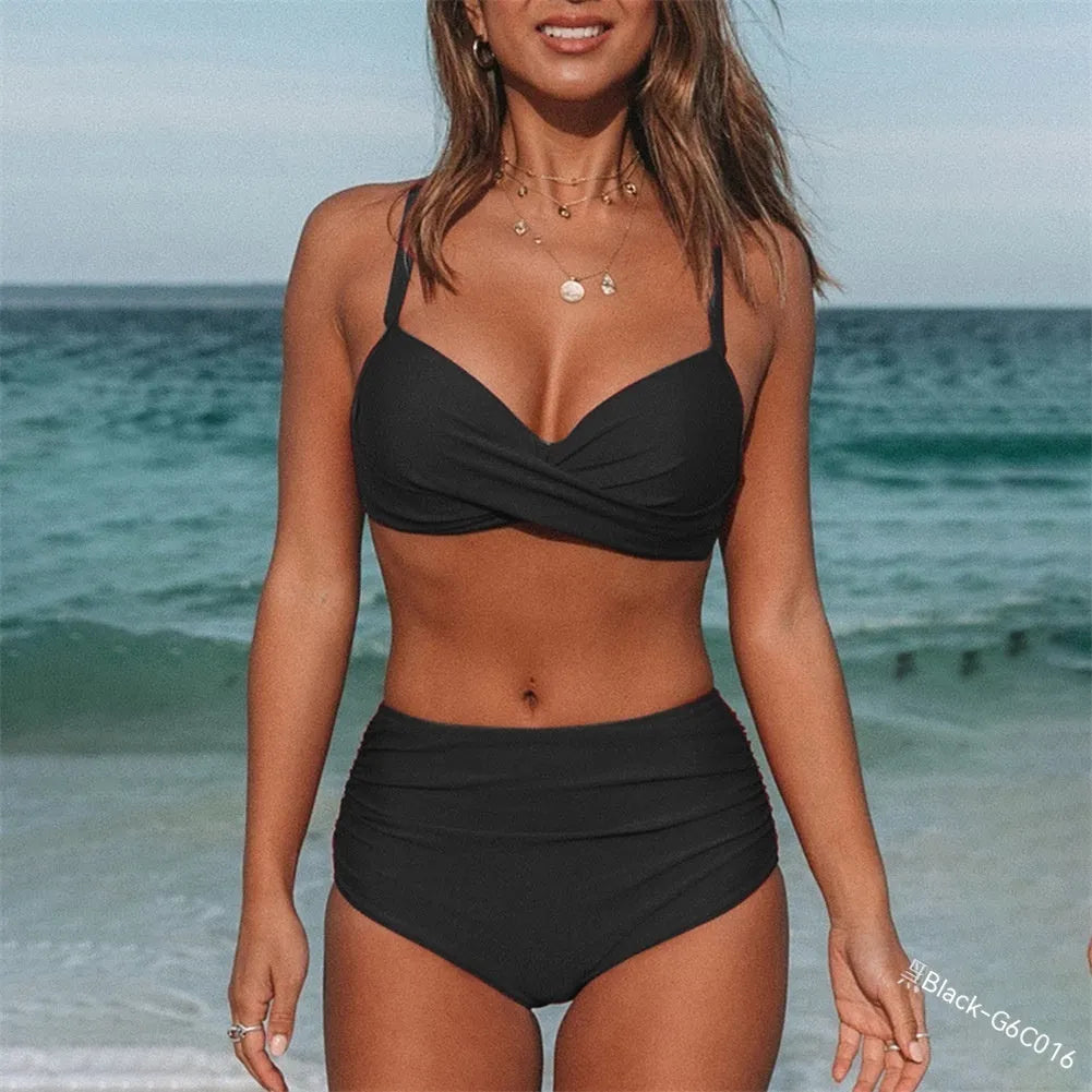 Women's solid colour swimwear bikini with cross strap design on black background