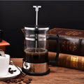 Compact stainless steel and glass manual coffee maker with 350ml capacity