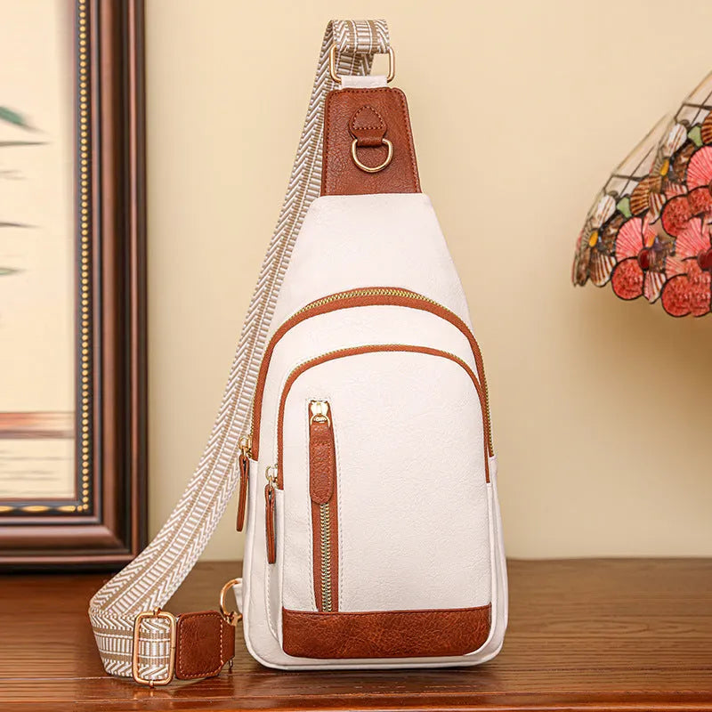 Soft brown PU leather women's crossbody messenger bag with an open front pocket and adjustable strap.