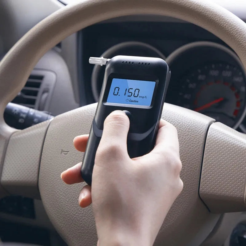 Black household alcohol breath tester unit for personal drunk driving checks.