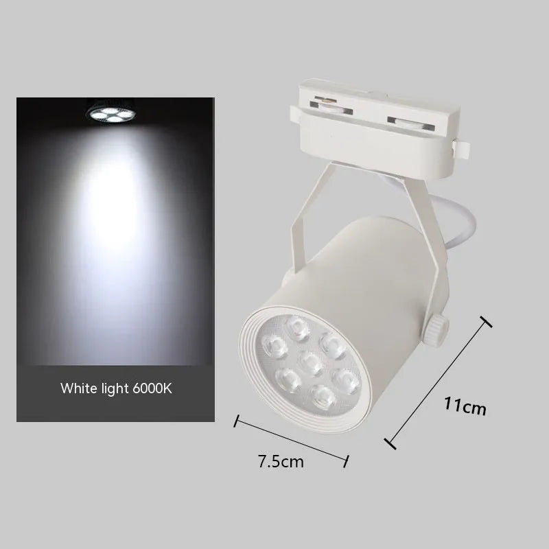 LED track spotlight with black aluminium shell mounted on lighting track