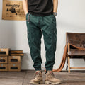 Men's tapered harem trousers in cotton with ankle band and zip placket front