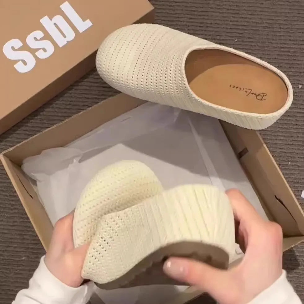 Women's baotou boken slippers in beige with a cloth upper and non-slip rubber sole.