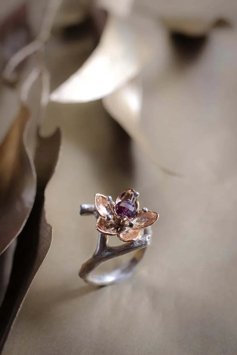 Silver two-tone floral geometric women's alloy ring shown on size guide from 5 to 11.