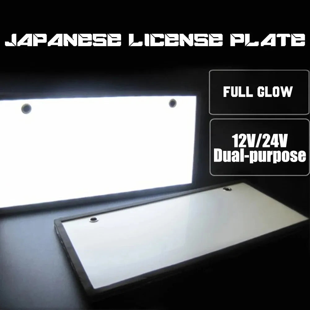 Two white LED truck licence plate lights with flat thin plastic housings and visible LED lamp bars.