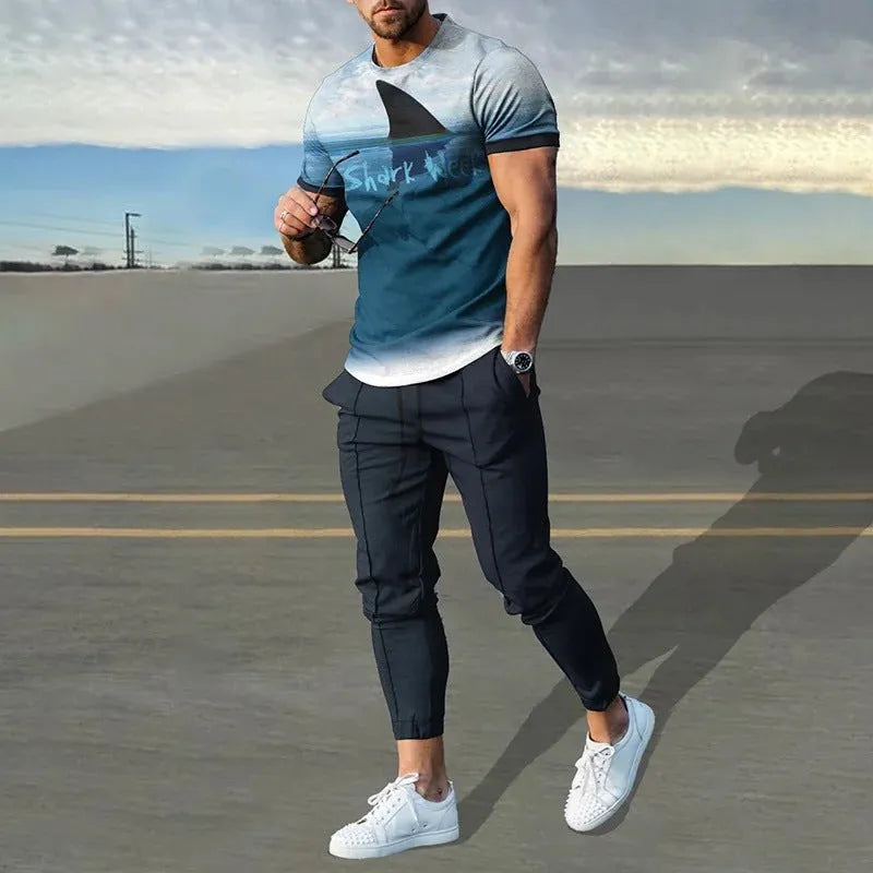 Men's thin short-sleeve printed pullover and matching trousers tracksuit set on a hanger.
