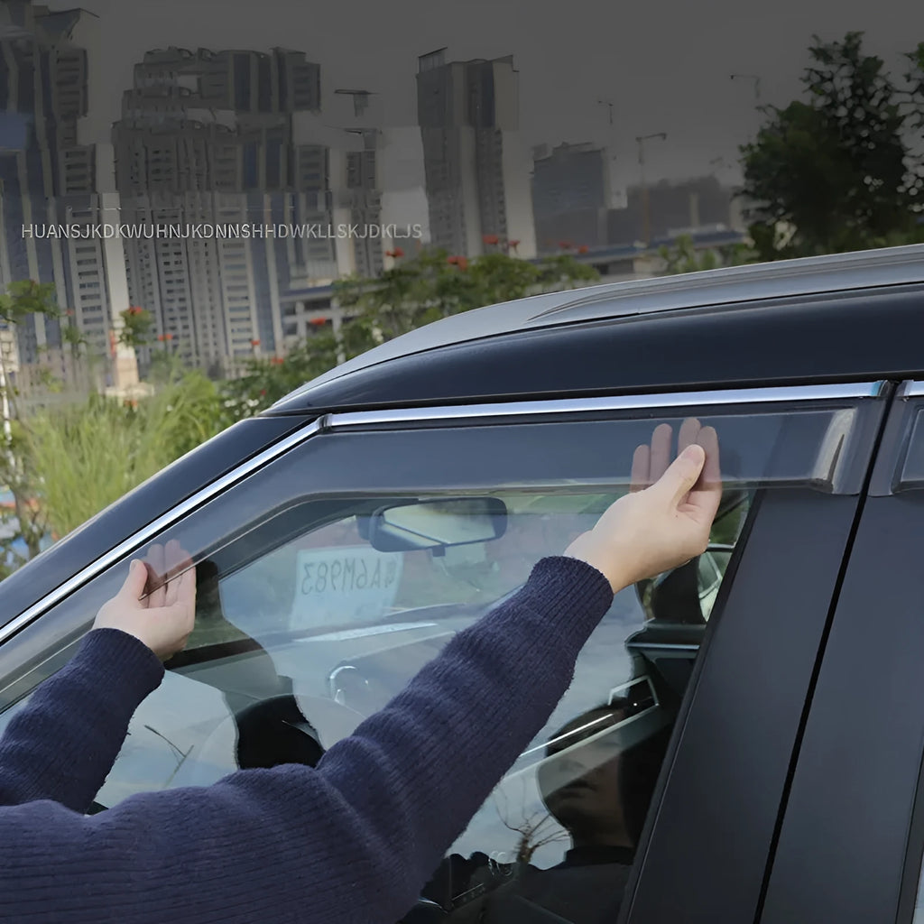 2023 Mitsubishi Outlander with black window deflectors installed on side windows
