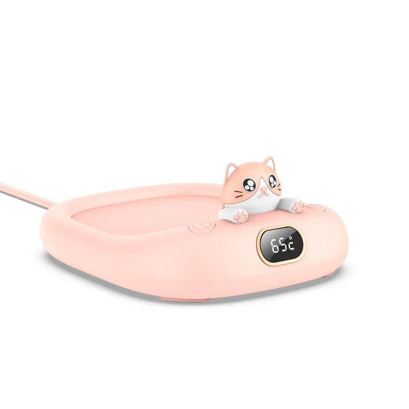 Pet cup warming holder in pink ABS and electroplated metal with a cup sitting on top
