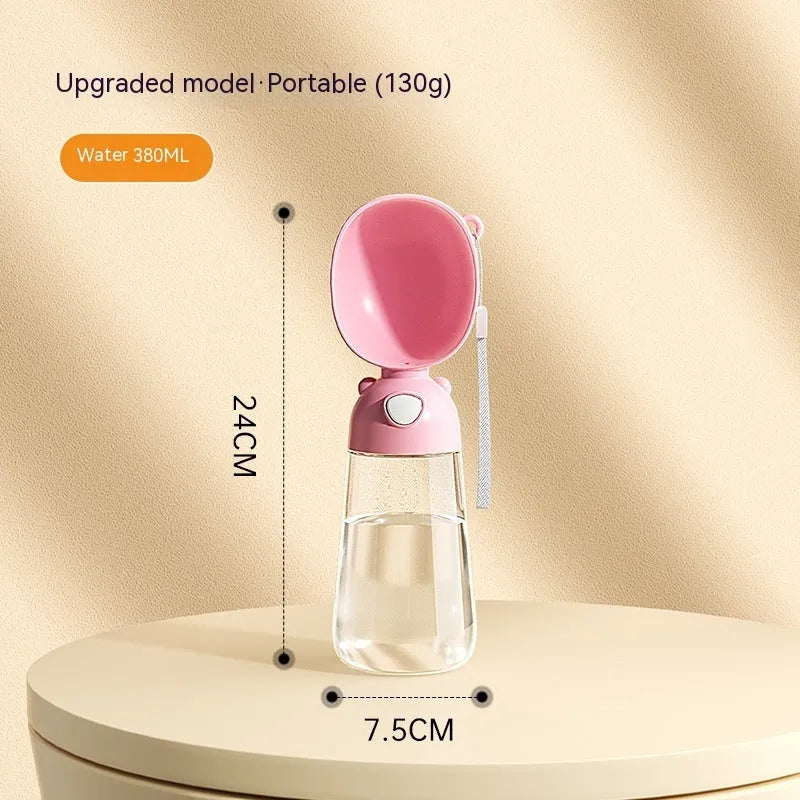 Portable dog water bottle and food container in yellow, pink, and brown for outdoor travel