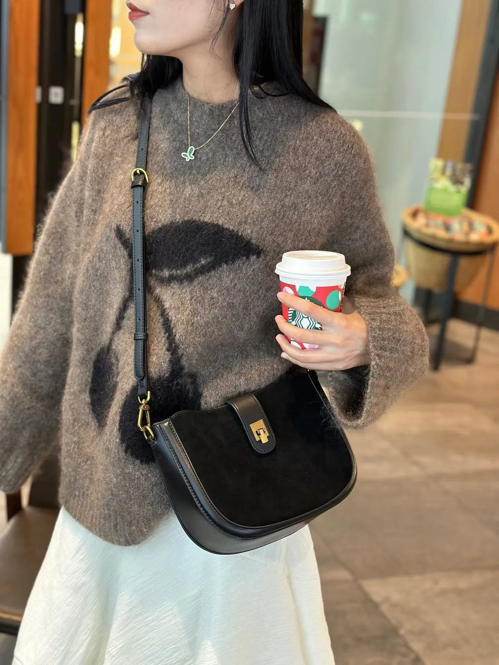 Women's brown genuine leather one-shoulder crossbody bag with a front sandwich pocket