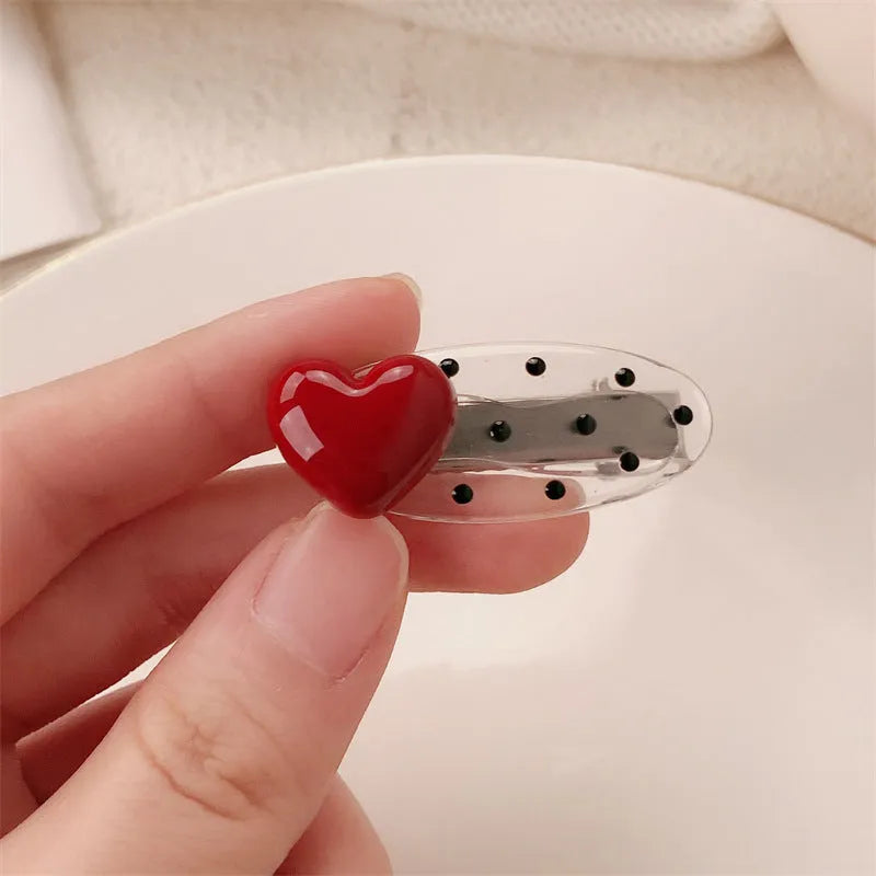 Red stereo love heart-shaped hairpin with French retro dots and willow leaf design