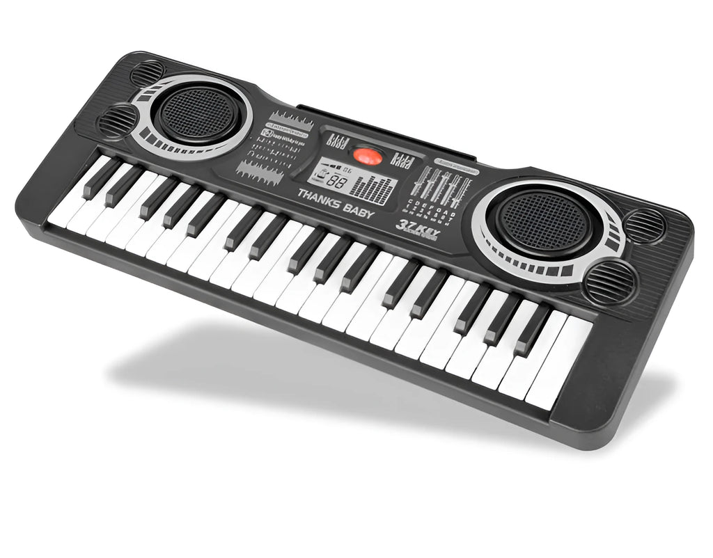 Children's 37-key electronic organ toy in black plastic on a table