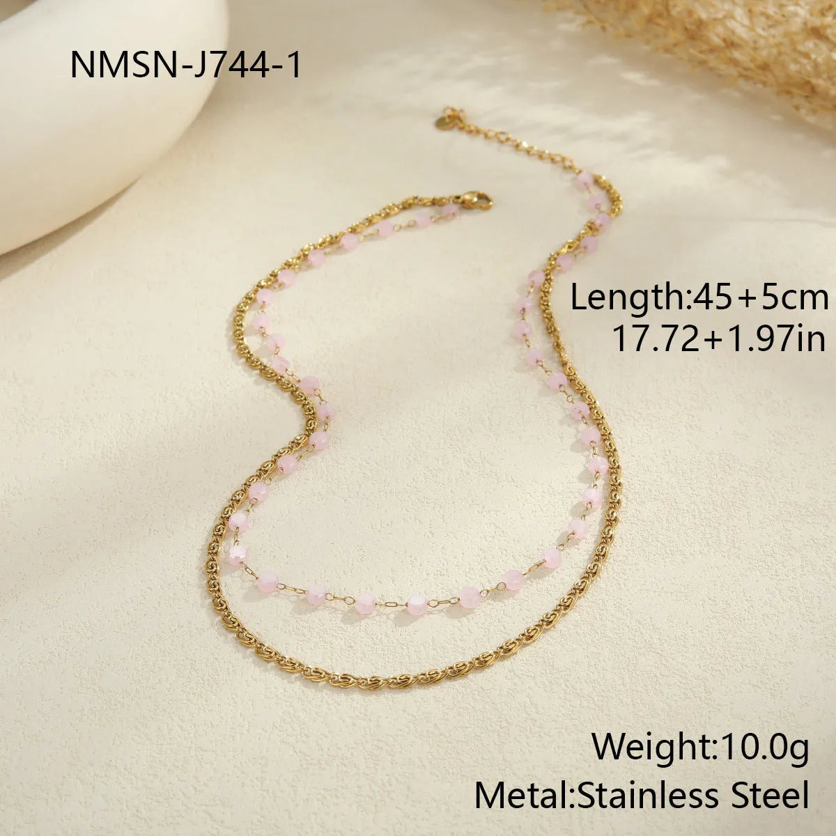 Stainless steel zircon necklace clavicle chain with beaded blue bracelet set geometric pendant on white background