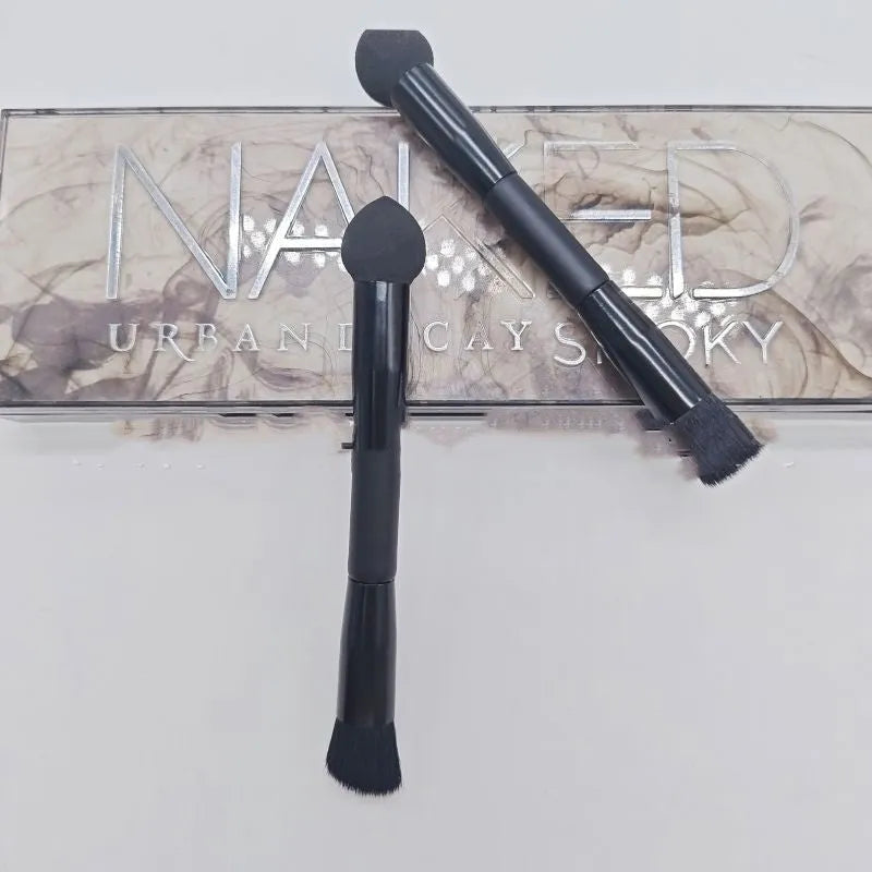 Black concealer brush with angled sponge tip and wooden handle for dark circle coverage