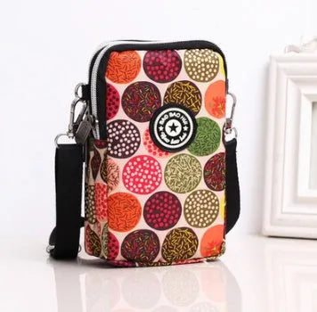 Vertical mobile phone bag in black with Oxford Spinning texture and zipper closure