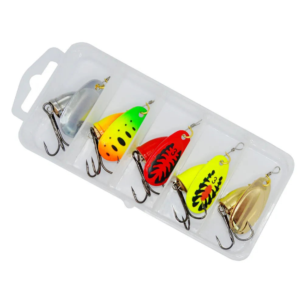 R composite metal fishing lure with rotating sequins and a copper bell in multiple colour options on a blue background.
