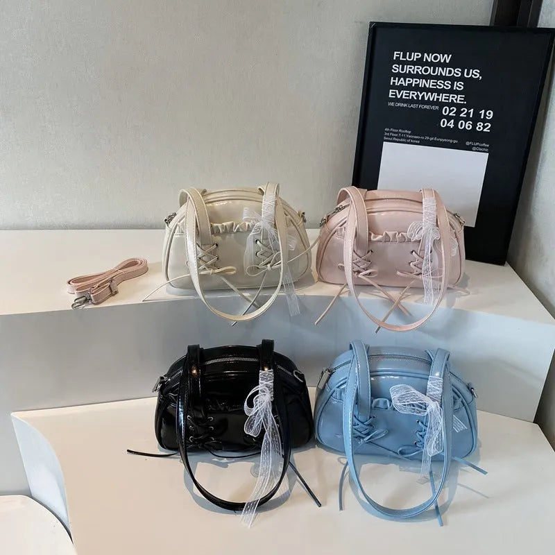 Women's fashion handbag with bow and bandage styling in PU leather, casual shoulder bag design