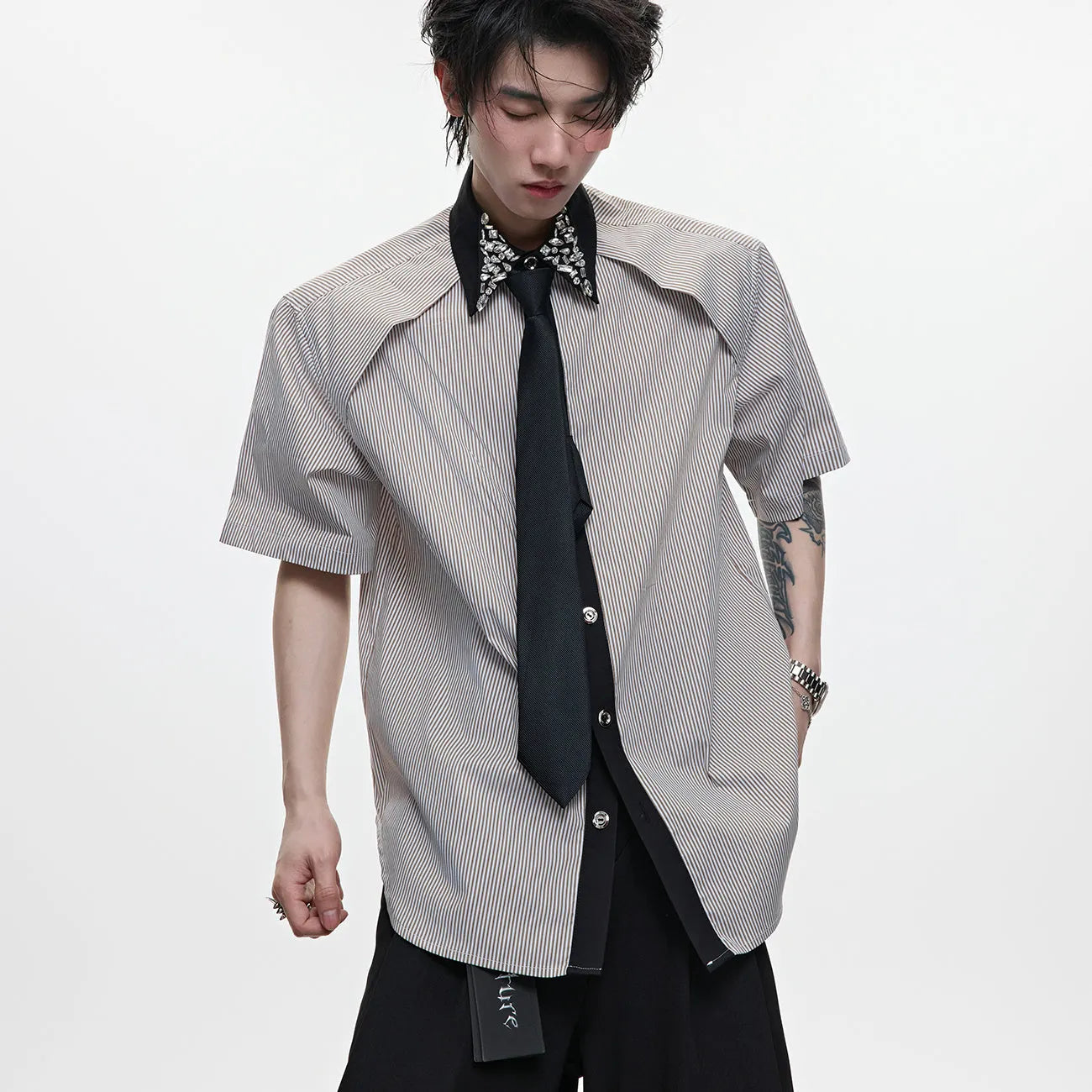 Men's blue and white patchwork striped shirt with diamond tie detail and quilted construction