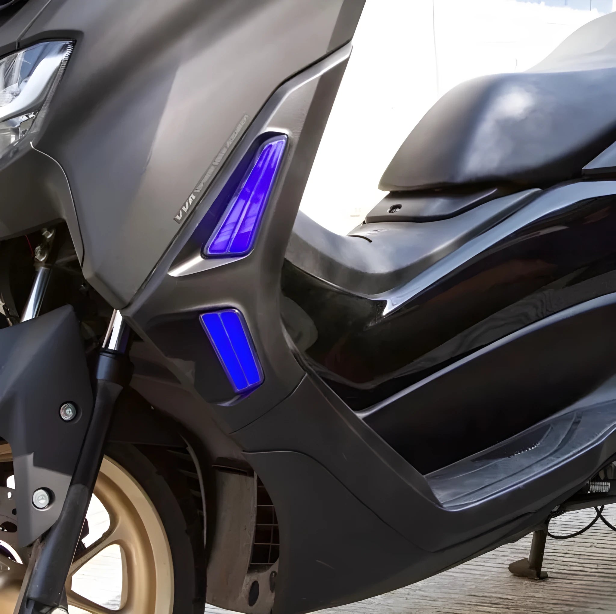 Pair of coloured LED steering direction lights for Yamaha NMAX155 scooter.