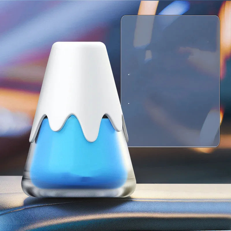Glass car aromatherapy diffuser in purple, lime, laurel, and blue colour options on a white background.