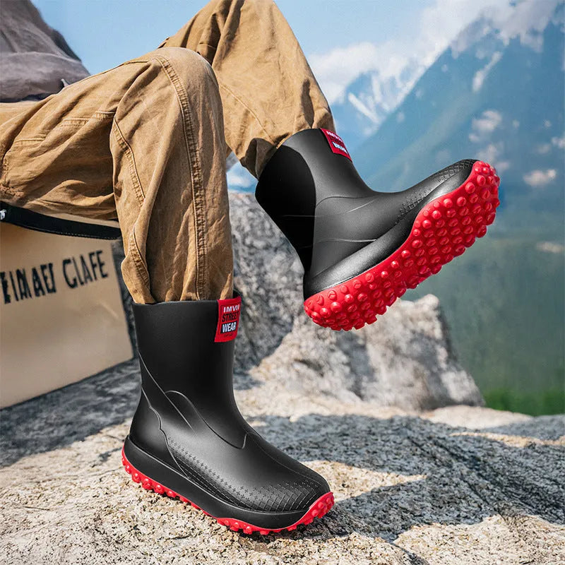 Men's mid-height PVC rain boot in beige colour with a round toe and plastic sole.