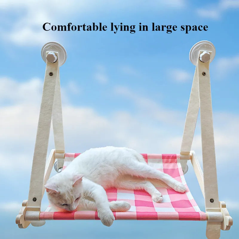 Wooden cat window hammock bed with linen fabric attached to window by suction cups