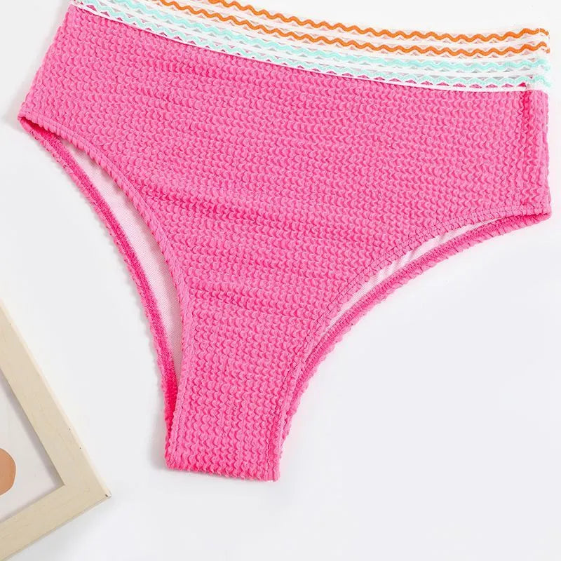 Women's high waist solid colour bikini set in white or pink, made from nylon fabric.
