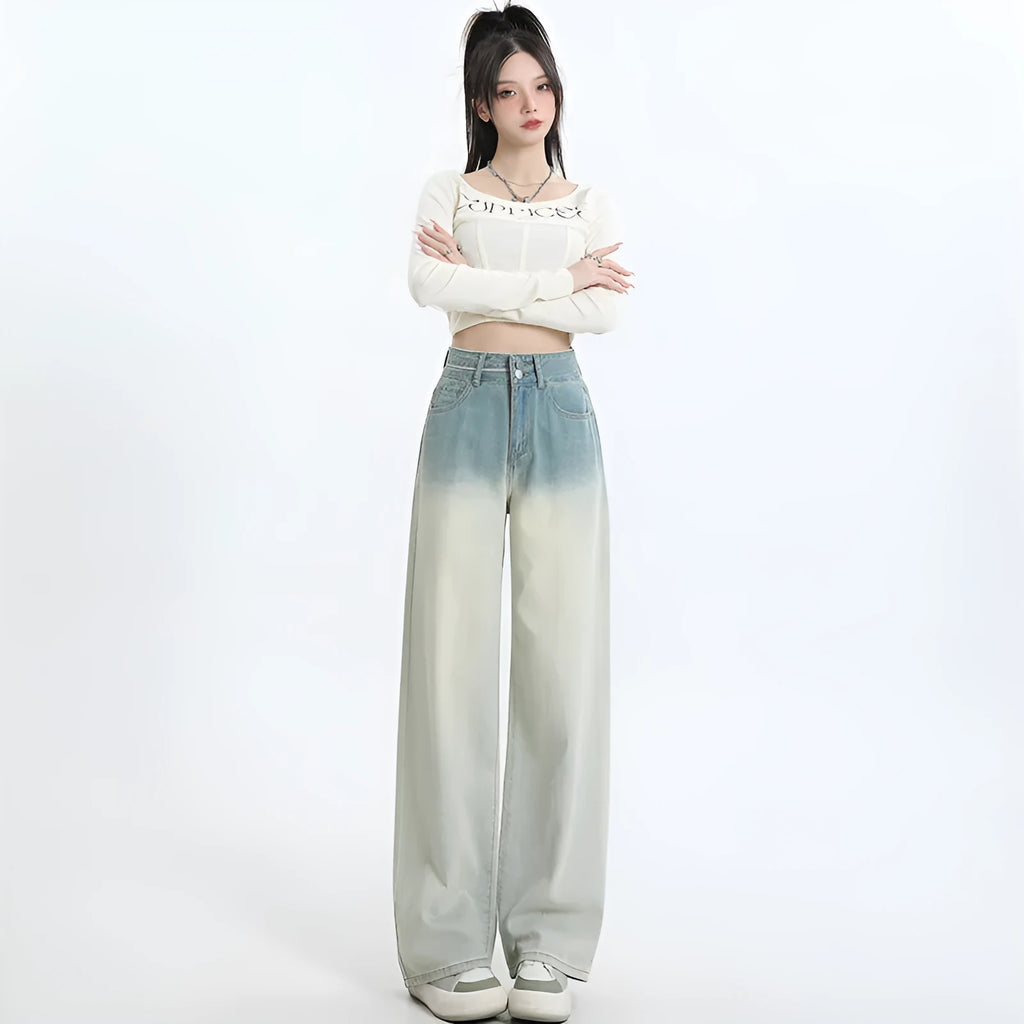 Women's gradient blue wide leg straight-leg denim trousers laid flat.
