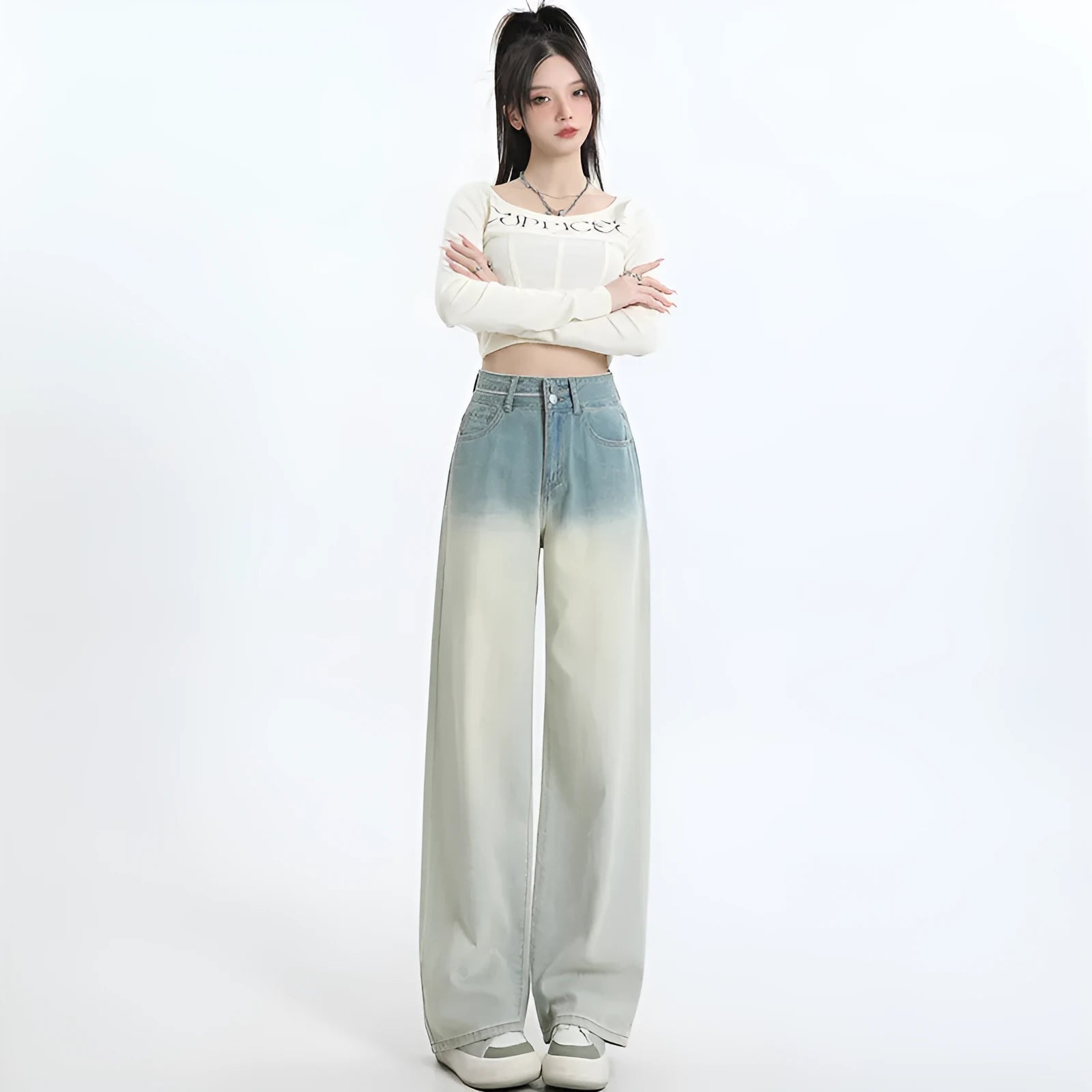 Women's gradient blue wide leg straight-leg denim trousers laid flat.