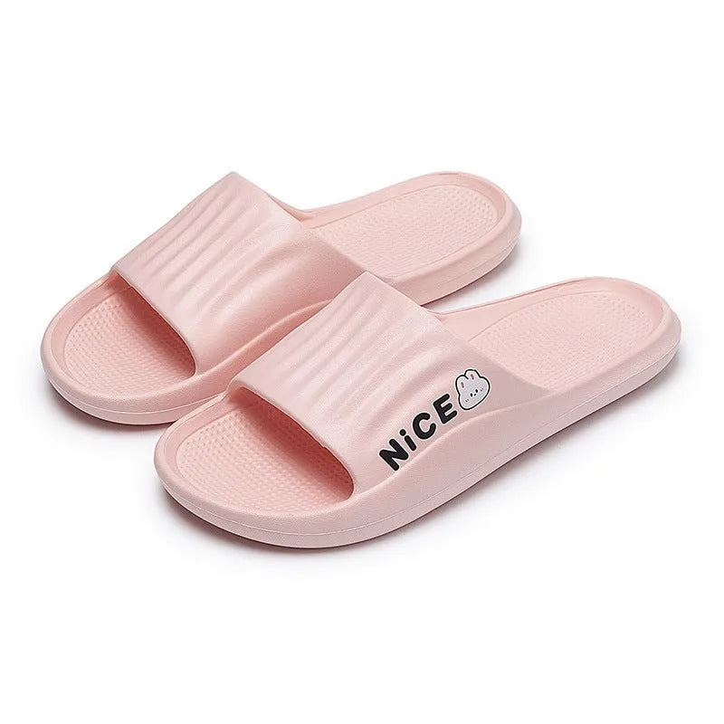 Adult unisex EVA cartoon pattern flip flop slippers in black, shown from above.