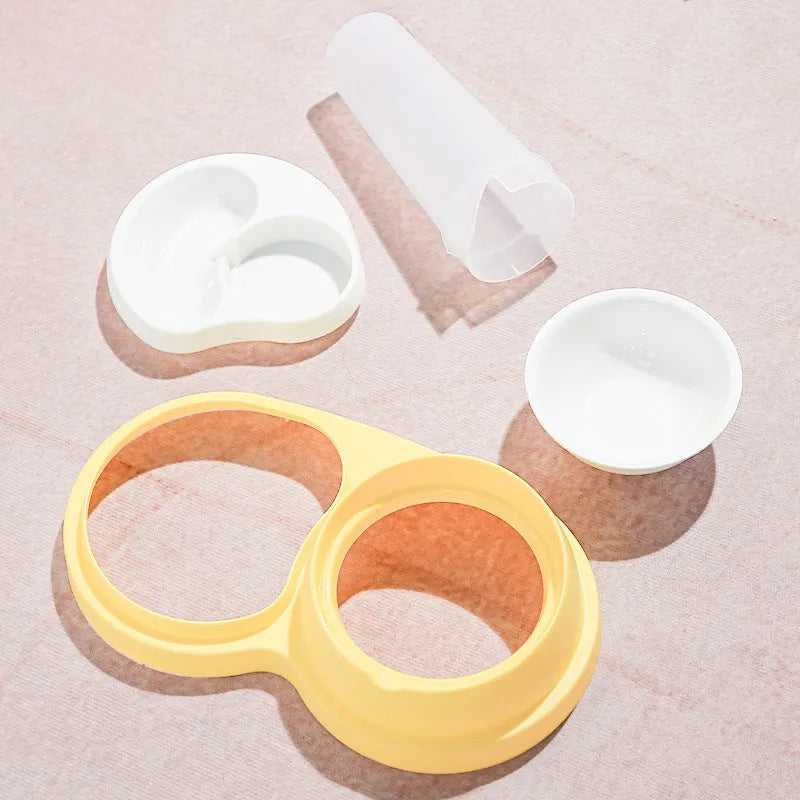 Grey and yellow dual-bowl pet feeder with raised neck collar and non-slip base