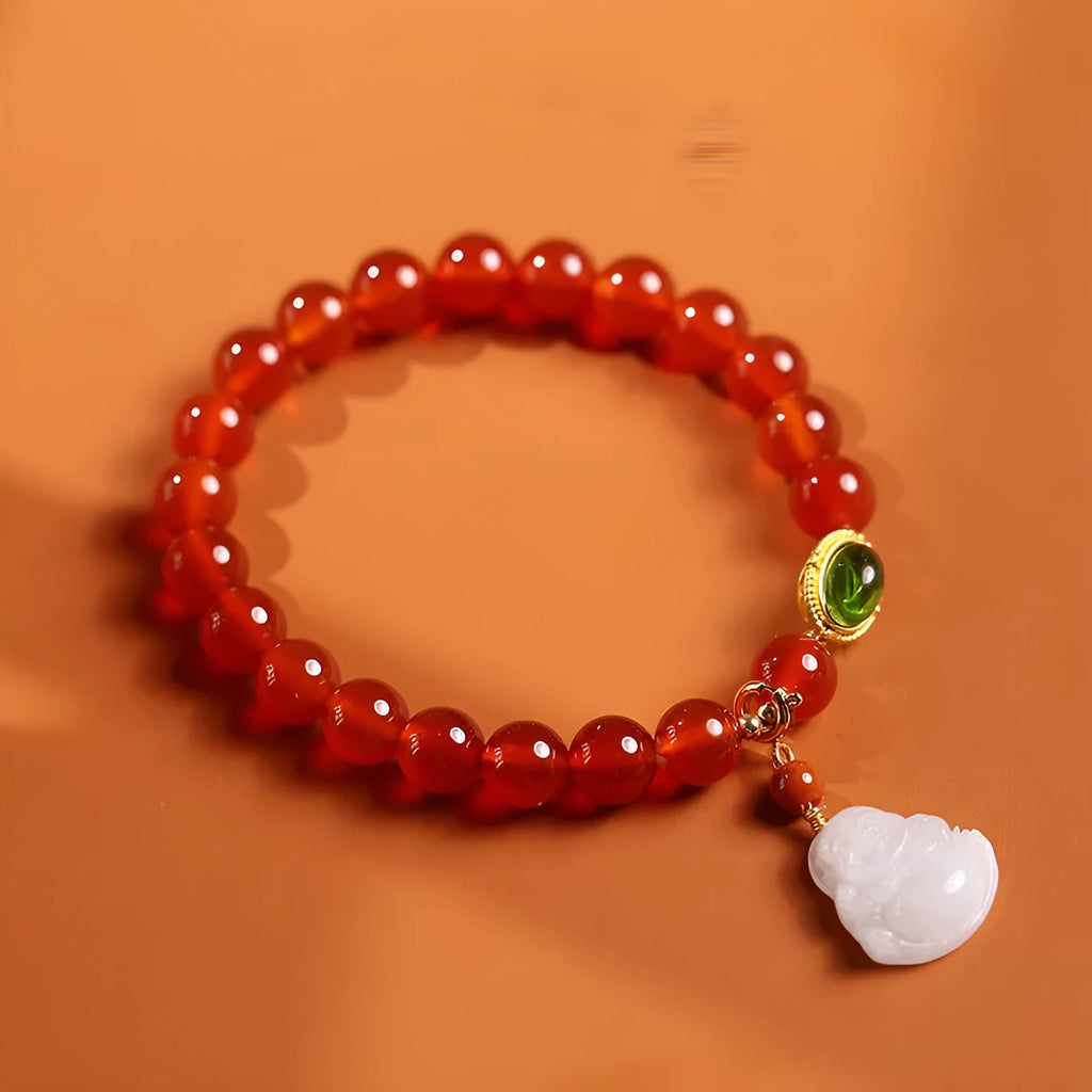 Red agate bracelet with amber geometric component and Maitreya Buddha pendant featuring ancient gold hanging jade accents