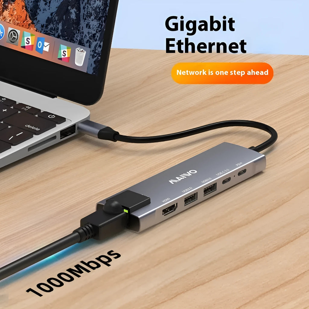 Aluminium six-in-one Steam Deck docking station showing USB, HDMI, and Ethernet ports.