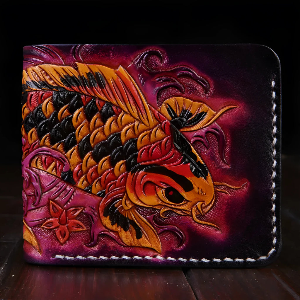 Men's blue hand-carved leather bifold wallet showing card slots and note compartment, placed on a wooden surface.