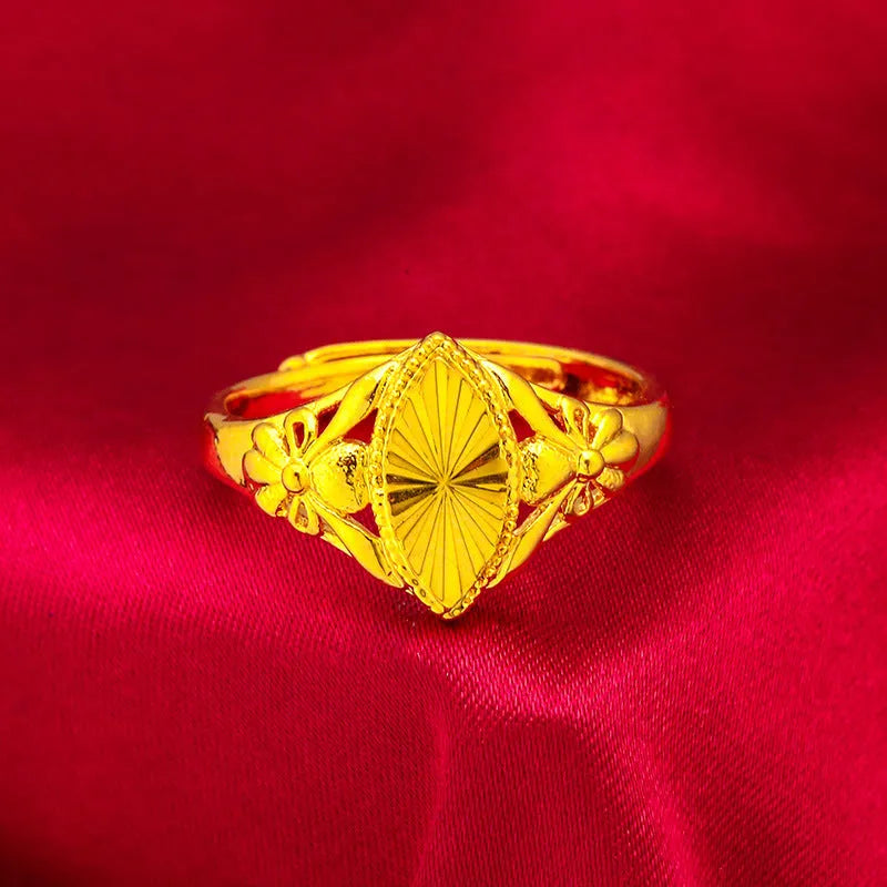 Alluvial gold coloured open diamond flower ring with geometric texture on brass metal