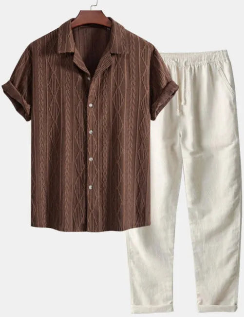 Lightweight linen-feel casual suit set with camouflage print trousers and a short-sleeved lapel shirt.