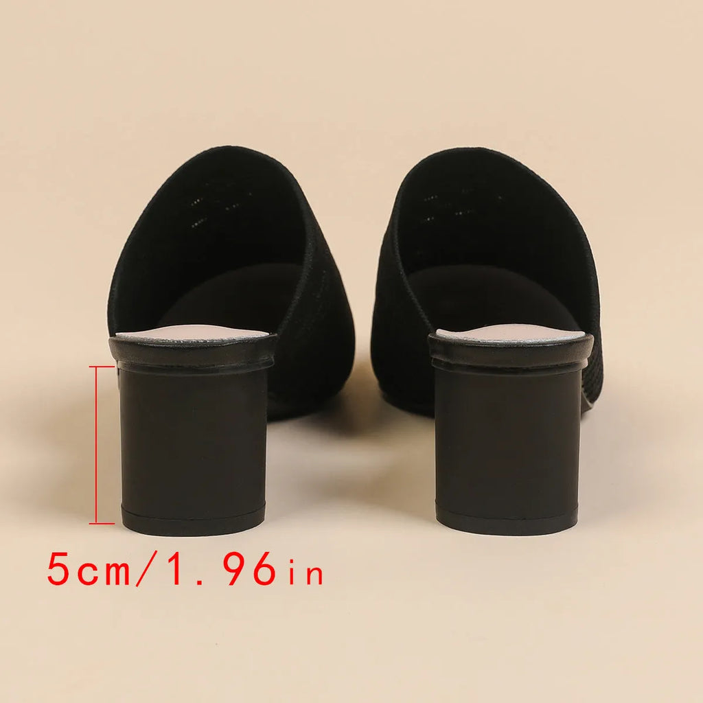 Women's black pointed toe sandals with decorative toe cap and 5cm chunky heel on a white background.