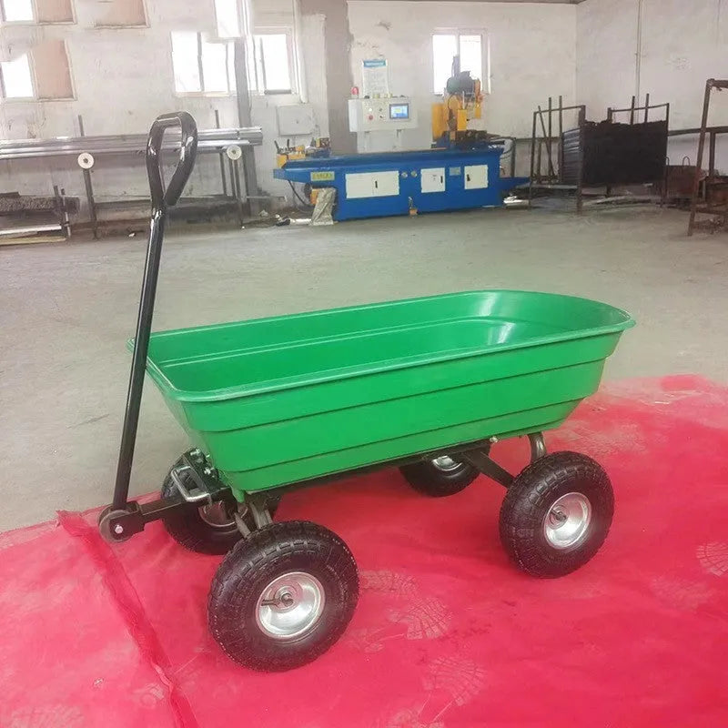 Green four-wheel plastic dump truck with a steel frame and tipping bed for garden and farm use.
