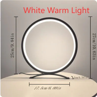 Modern minimalist desk lamp with metal stand, USB cable, and compact 25cm base in black warm light finish