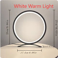 Modern minimalist desk lamp with metal stand, USB cable, and compact 25cm base in black warm light finish