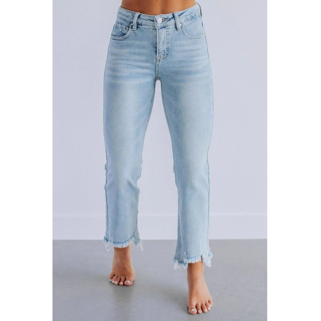 Solid colour women's denim trousers with a hand-worn finish in dark blue and light blue.