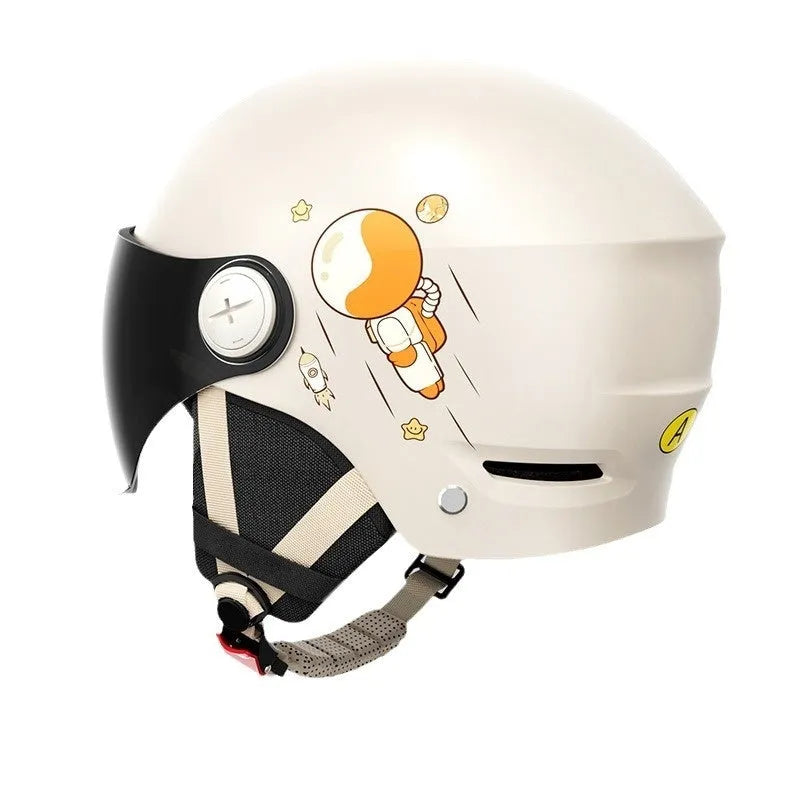 Khaki coloured open-face motorcycle helmet with integrated long mirror sunglasses on a table.