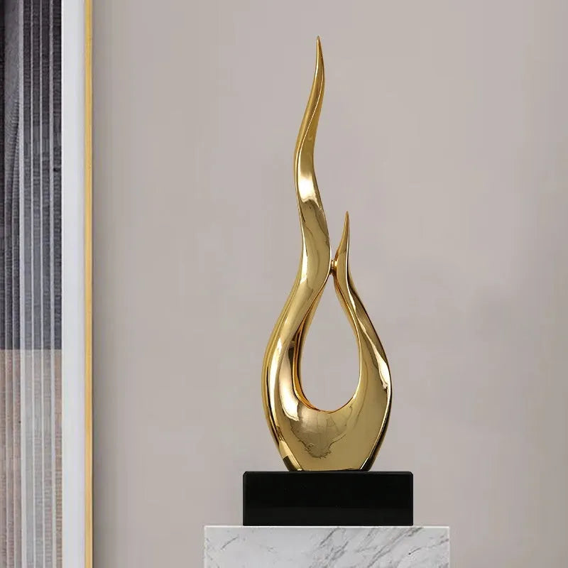 Resin festival high-rise decoration craft in bright gold colour with modern simplicity design