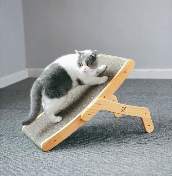 Deformation cat bed and scratcher in primary colour with corrugated paper surface, pine frame and three adjustable angles.