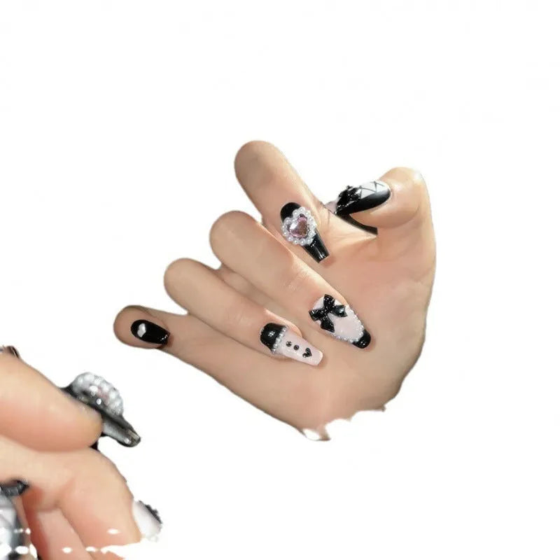 Hand-painted black pink heart and bow pattern cat's eye artificial nails in four sizes