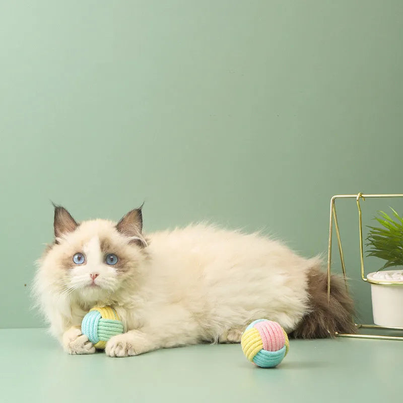 Handmade 5cm cat hair ball plush toy in cotton fabric for teeth grinding and interactive play