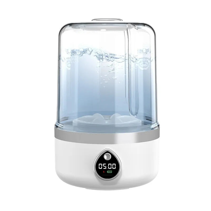 White portable USB-powered mini washing machine on a countertop.